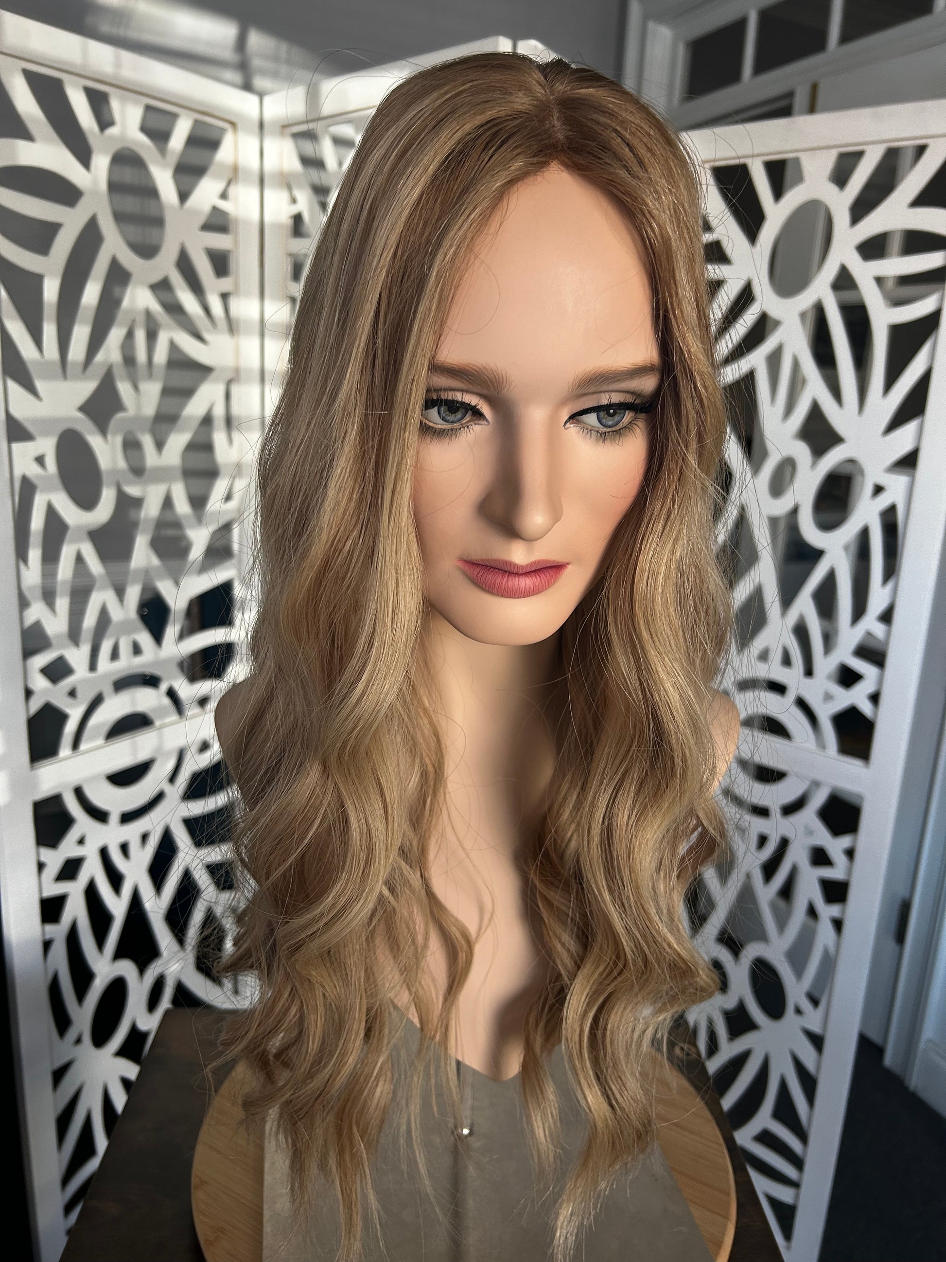 Mix of cool and warm toned blond with light brown roots and dimensional warm lowlights Human Hair Topper